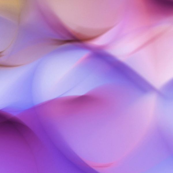 Abstract visual representing energy flow and vitality with soft pastel colors.